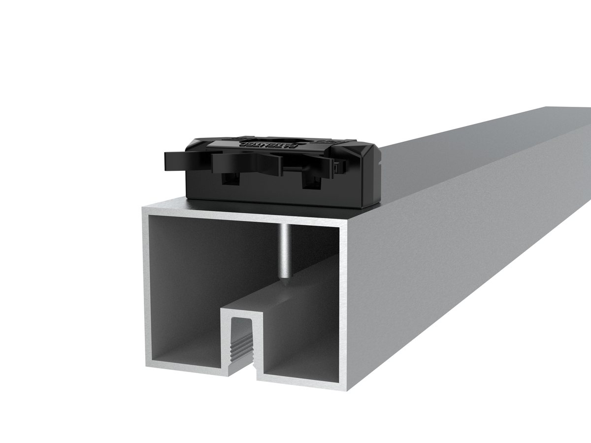 Shark clip seated on top of an aluminum decking joist