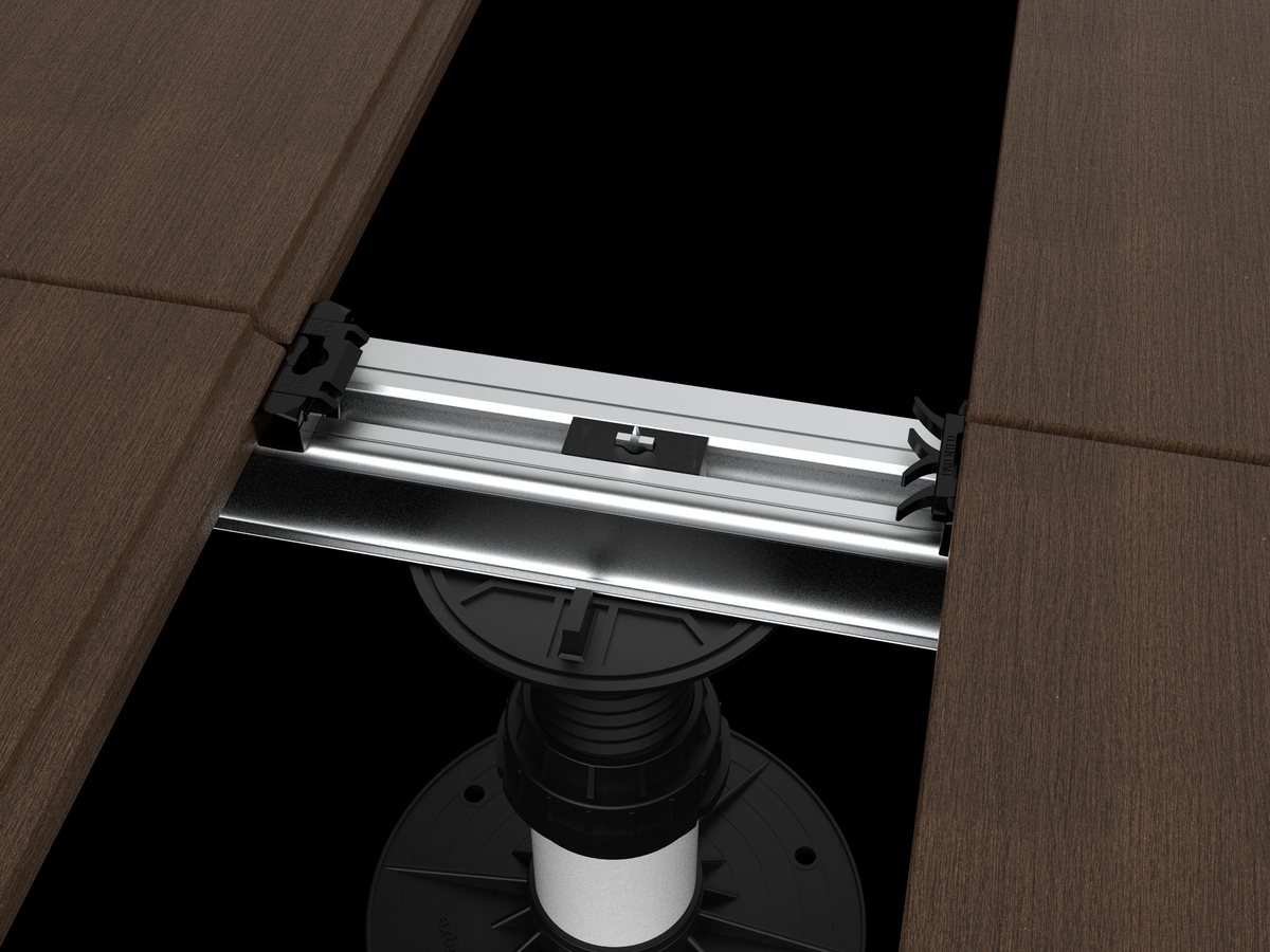 Aluminum joist on an adjustable pedestal between Exterpark deck boards, with Shark clips